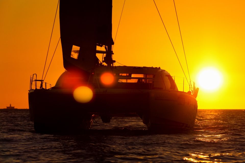 Lisbon: Sunset Catamaran Cruise, Drink, and Music - Meeting Point and Requirements