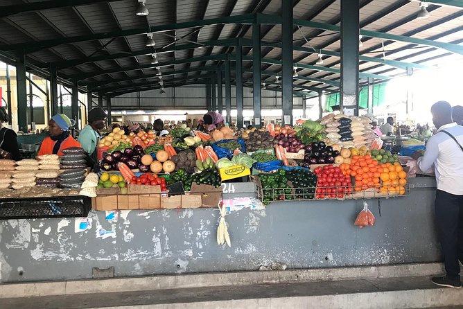 Maputo Indispensable Downtown Walking Tour With Refreshments - Refreshments and Market Exploration