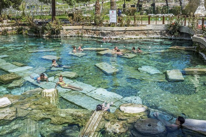 Pamukkale Hot Springs and Ancient City of Hierapolis With Lunch From Kusadasi - Explore Ancient Roman Ruins