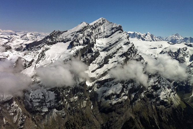 Private Swiss Alps Helicopter Tour Over Snow Covered Mountain Peaks and Glaciers - Intimate Sightseeing Experience