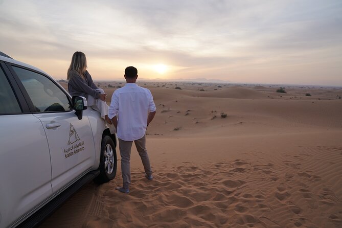 Dubai Desert Safari: Camel Ride, Sandboarding, BBQ & House Drinks - Cancellation and Refund Policy