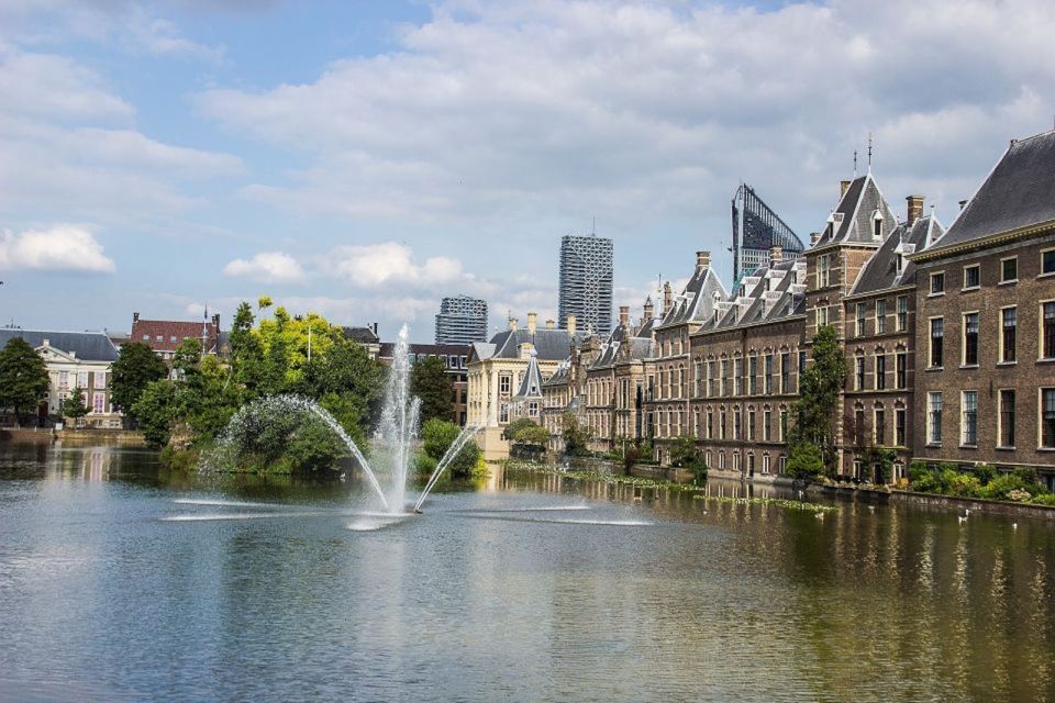 From Amsterdam: The Hague and Delft Sightseeing Tour - Transportation and Pickup