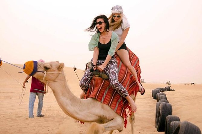 Morning Dubai Red Dune Safari, Quad Bike (ATV), Sand Boarding and Camel Ride - Sand Boarding Thrills