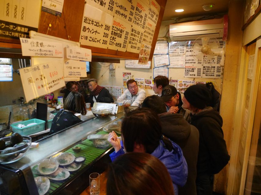 Osaka: Tenma and Kyobashi Night Bites Foodie Walking Tour - Discovering Tenmas Timeless Streets