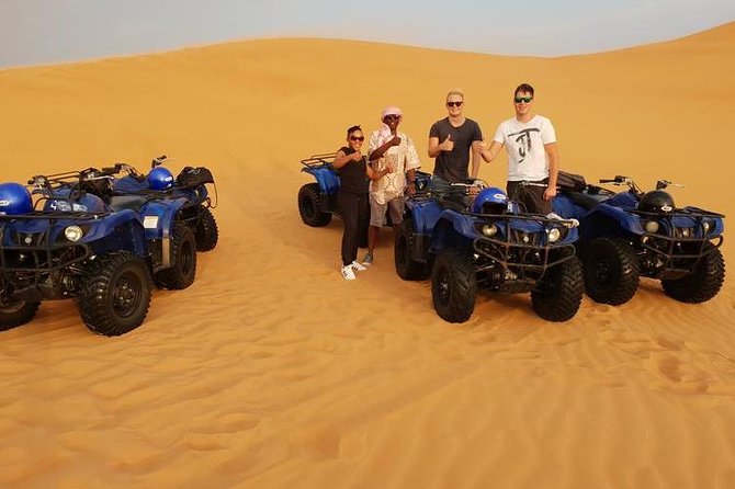 Evening Red Dunes Desert Safari With Quad Bike - Pickup and Transportation