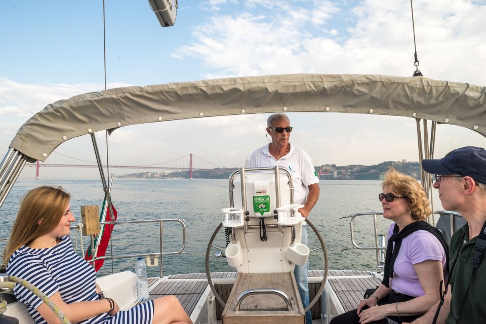 Lisbon: Private Sunset Cruise on the Tagus River With Drink - Onboard Experience