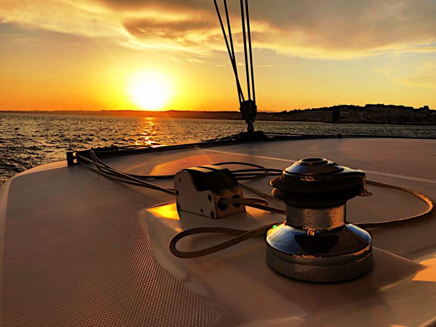 Lisbon: Sunset Catamaran Cruise, Drink, and Music - Booking and Cancellation Policy