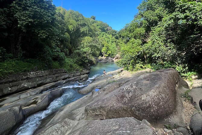 The El Yunque Waterslide and Waterfall Tour With Food and Photos - Exploring the Rainforest Waterslide