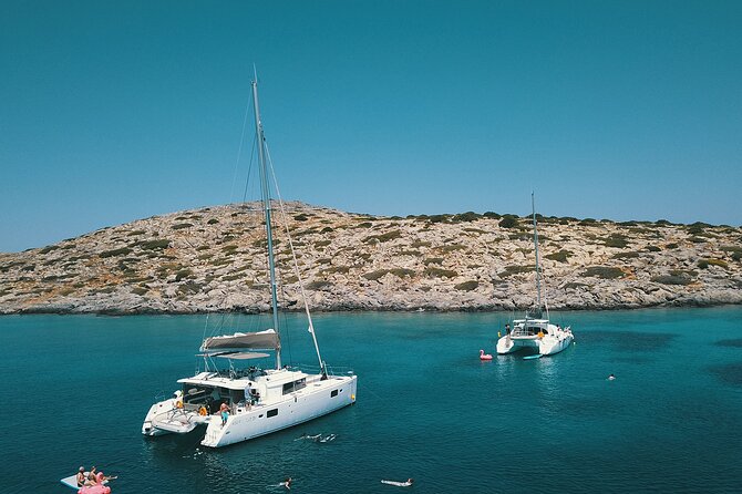 Agios Nikolaos Evening Catamaran Cruise in Mirabello With Dinner - Cruise Departure and Itinerary