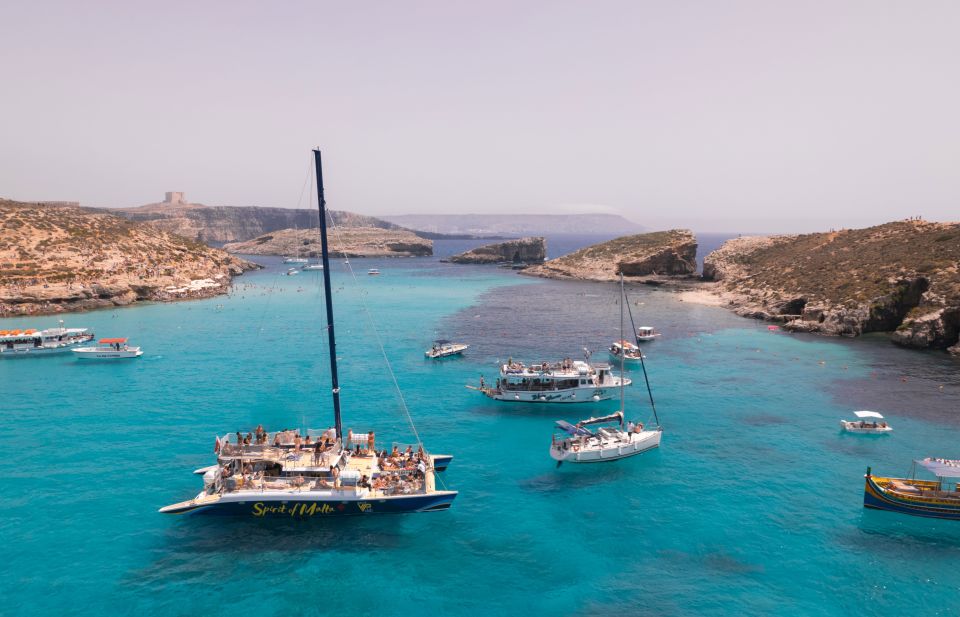 Comino: Blue Lagoon Catamaran Cruise With Lunch and Open Bar - Key Points