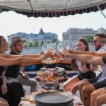 Montreal: Guided Electric Boat Cruise With Onboard Drinks Key Points