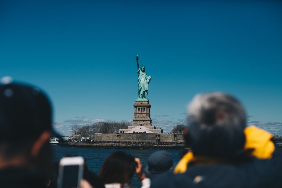 NYC: Statue of Liberty & Ellis Island Guided City Boat Tour - Key Points