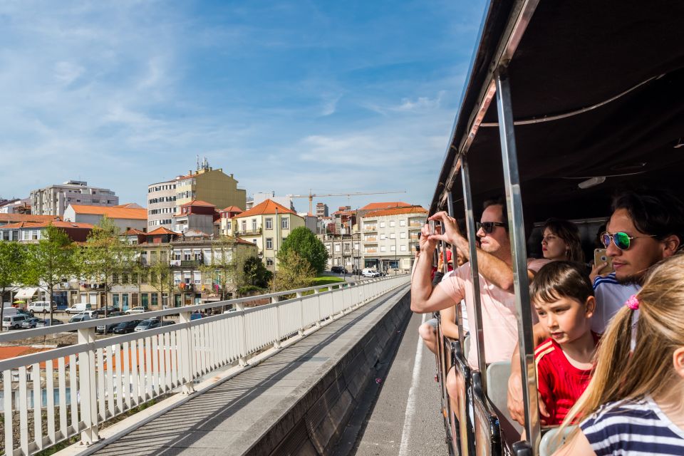 Porto: City Train Tour, River Cruise & Wine Cellar - Key Points