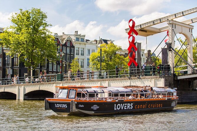 Amsterdam 1-Hour Sightseeing Canal Cruise by Semi-Open Boat - Overview and Inclusions