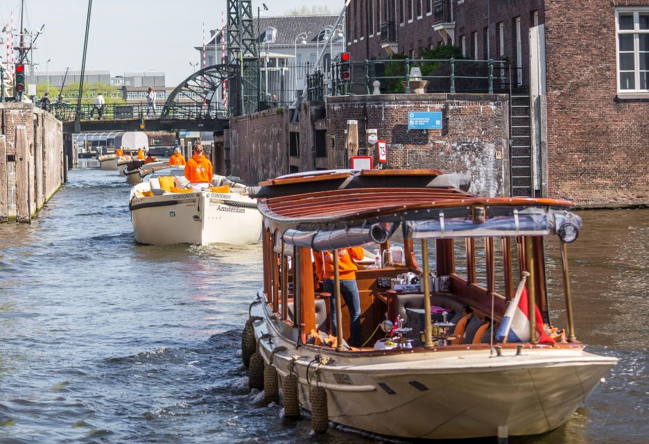 Amsterdam: Open Boat Cruise With Unlimited Drinks Option - Tour Highlights