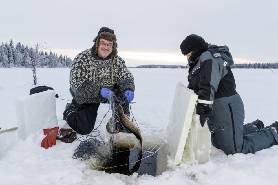 Levi: Ice Fishing by Snowmobile - Snowmobile Safari Through Lapland