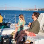 Lisbon: Sunset Catamaran Tour With Music And Drink Tour Overview And Details