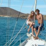 Private Sunset Sailing Charter For Couples From Corralejo Relaxing On The Deck