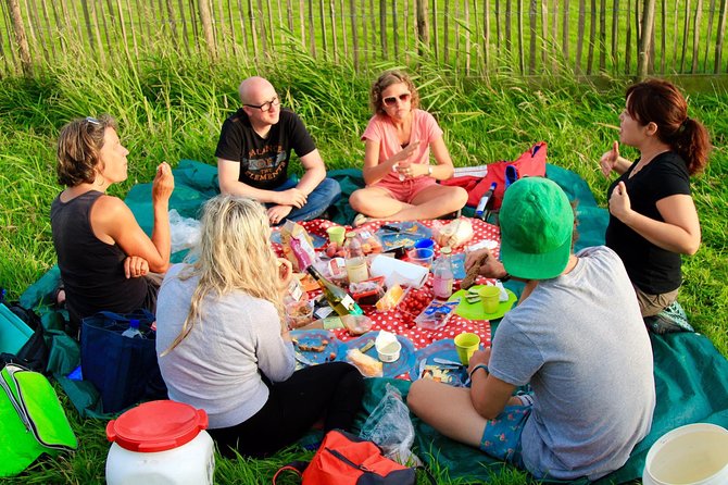 Small-Group Guided Sunset Canoe Tour in Waterland With Dinner - Tour Overview