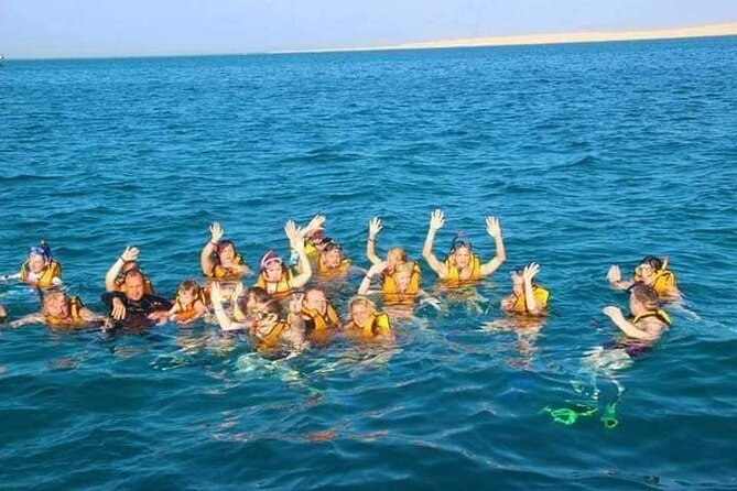 Swimming With Dolphins and Banana Boat Sea Trip Day Experience - Hurghada - Dolphin House Reef Experience