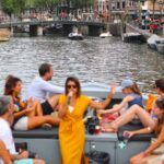 Visit Amsterdam By Boat With A French Guide Tour Overview