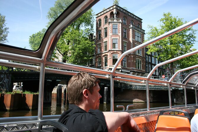 Amsterdam 1-Hour Sightseeing Canal Cruise by Semi-Open Boat - Unobstructed Waterfront Views