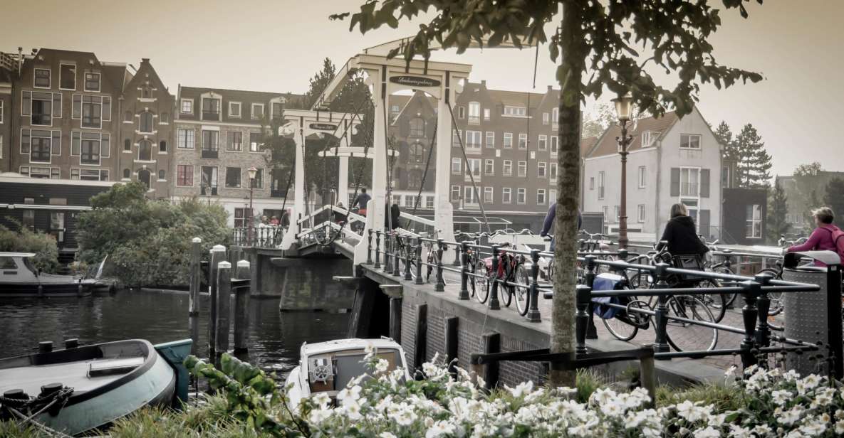 Amsterdam: Guided City Bike Tour in French - Itinerary Highlights