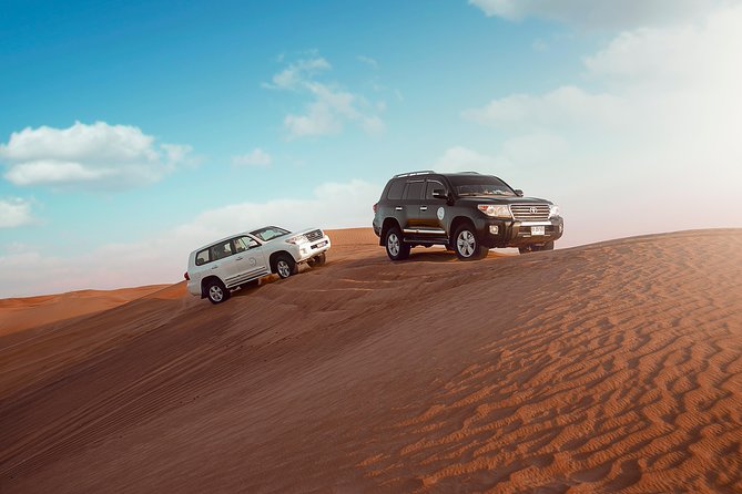 Desert Safari Dubai With Dune Bashing, Sandboarding, Camel Ride, 5 Shows, Dinner - Thrilling Dune Bashing Experience