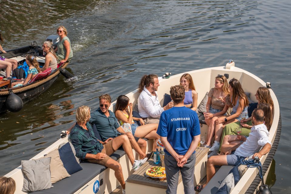 Amsterdam: German Guided Canal Cruise With on Board Bar - Onboard Experience