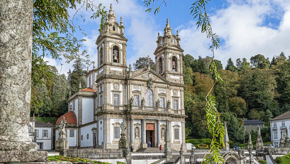 From Porto: Braga & Guimarães Full Day Experience With Lunch - Guimarães Castle and Photo Stops