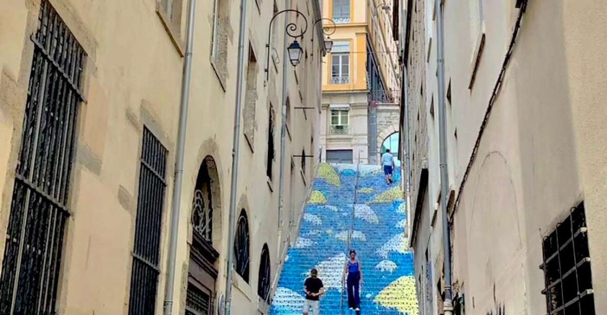 Lyon: Street Art & Street Food Tour - Uncovering Urban Art Techniques