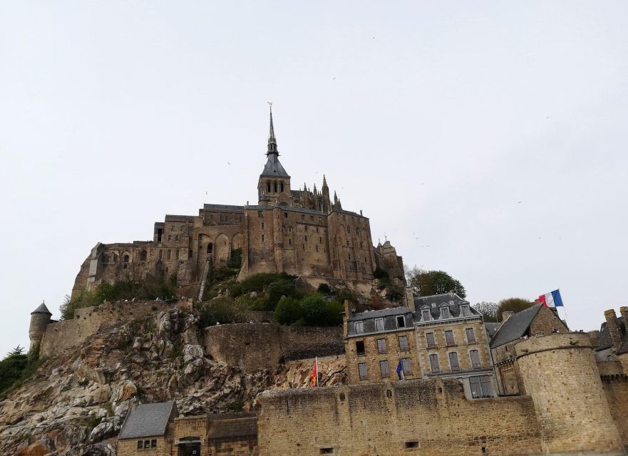 Mont Saint Michel Private VIP Tour With Champagne From Paris - Exploring Omaha Beach