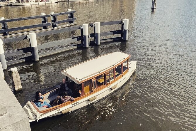 Private Boat Tour: Champagne Canal Cruise in Amsterdam - Highlights of the Canal Cruise