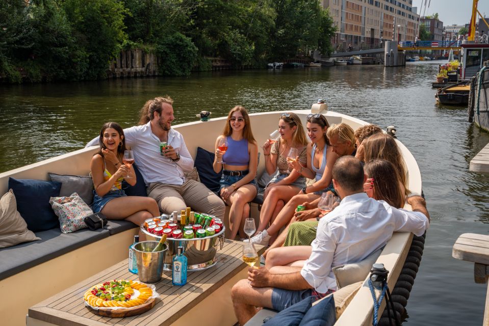 Amsterdam: Private Canal Booze Cruise With Unlimited Drinks - Boat and Amenities