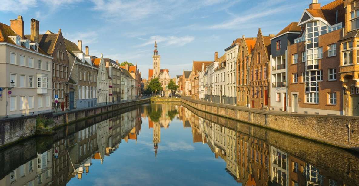 From Amsterdam: Day Trip to Bruges in Spanish or English - Meeting Point and Time