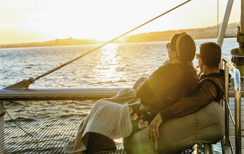 Lisbon: Sunset Catamaran Tour With Music and Drink - Booking and Meeting Information