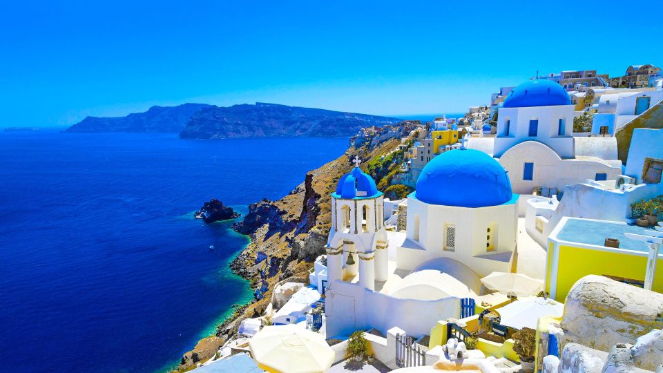 Santorini Island: Guided Tour From Heraklion Crete - Language and Tour Guide