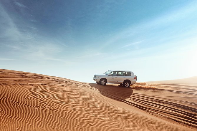 Desert Safari Dubai With Dune Bashing, Sandboarding, Camel Ride, 5 Shows, Dinner - Delectable International Buffet Dinner