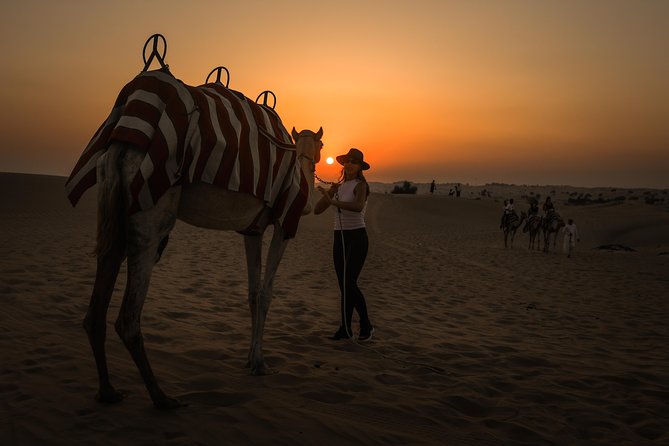 Dubai: Sunset Camel Caravan Safari With BBQ Dinner at Al Khayma Camp - Camel Ride Experience