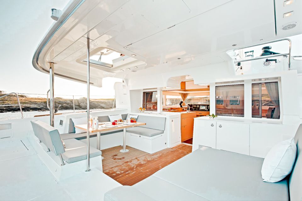 Santorini: Catamaran Tour With BBQ Meal and Unlimited Drinks - Onboard Amenities