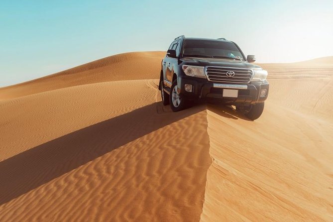 Desert Safari Dubai With Dune Bashing, Sandboarding, Camel Ride, 5 Shows, Dinner - Memorable Photo Opportunities