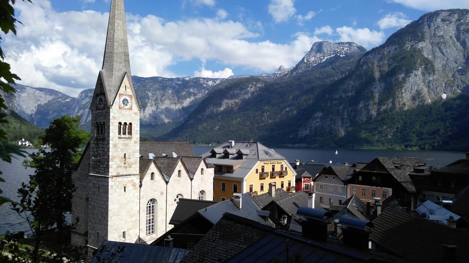 From Vienna: Guided Day Trip to Melk, Hallstatt, & Salzburg - Discovering Salzburgs Attractions