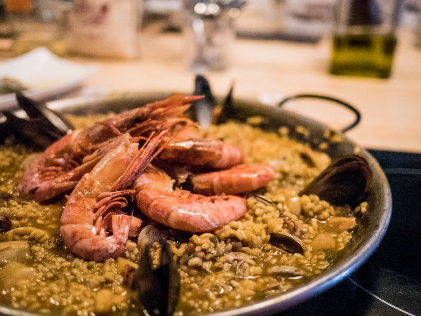 Premium Paella Cooking Class, Includes Tapas & Market Tour - Location and Meeting