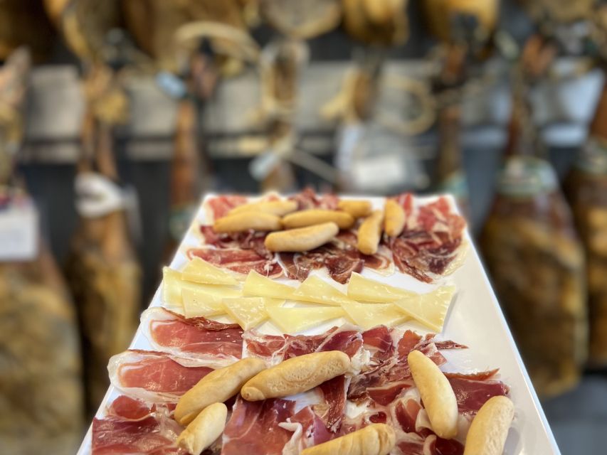 San Sebastian: Market, Pintxos and Wine Tasting Tour - Guided Walking Tour