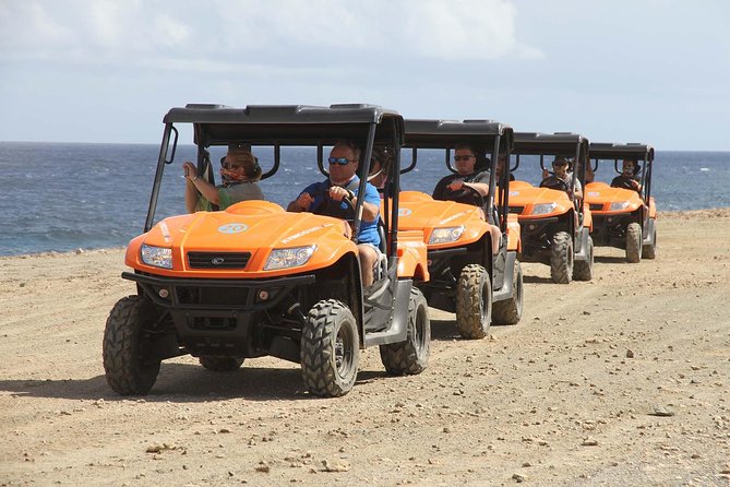 Aruba UTV Tour With Natural Cave Pool and Cliff Jumping - Cliff Jumping and Swimming