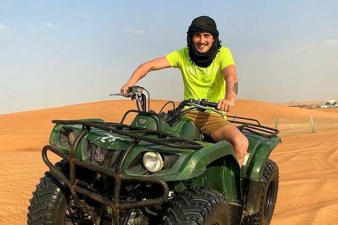 Desert Quad Biking Tour and Sand Boarding With Dinner in Dubai - What to Expect on the Tour