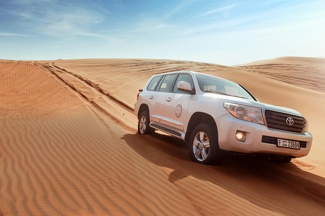 Desert Safari Dubai With Dune Bashing, Sandboarding, Camel Ride, 5 Shows, Dinner - Convenient Pickup and Cancellation Policy