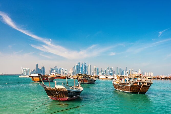 Experience Doha City Tour With Local Guide and Dhow Ride - Cancellation Policy and Pricing