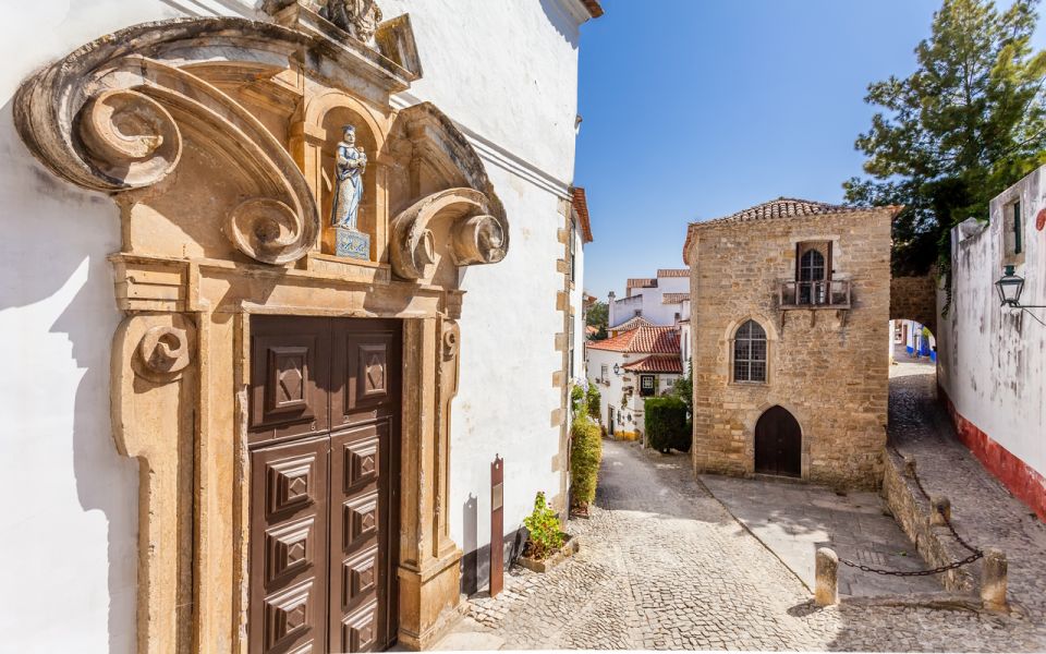 Obidos, Nazare, Alcobaça, and Batalha Full-Day Tour - Fishing Village of Nazaré