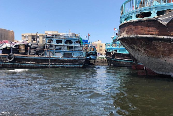 Old Dubai Walking Tour: Abra Ride, Creek, Spice & Gold Souks. - Discovering the Textile Market